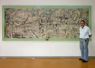 Giovanni Massolo accanto al bozzetto de «La luna e i falò» nell’aula studio dell’Università Amedeo Avogadro di Alessandria